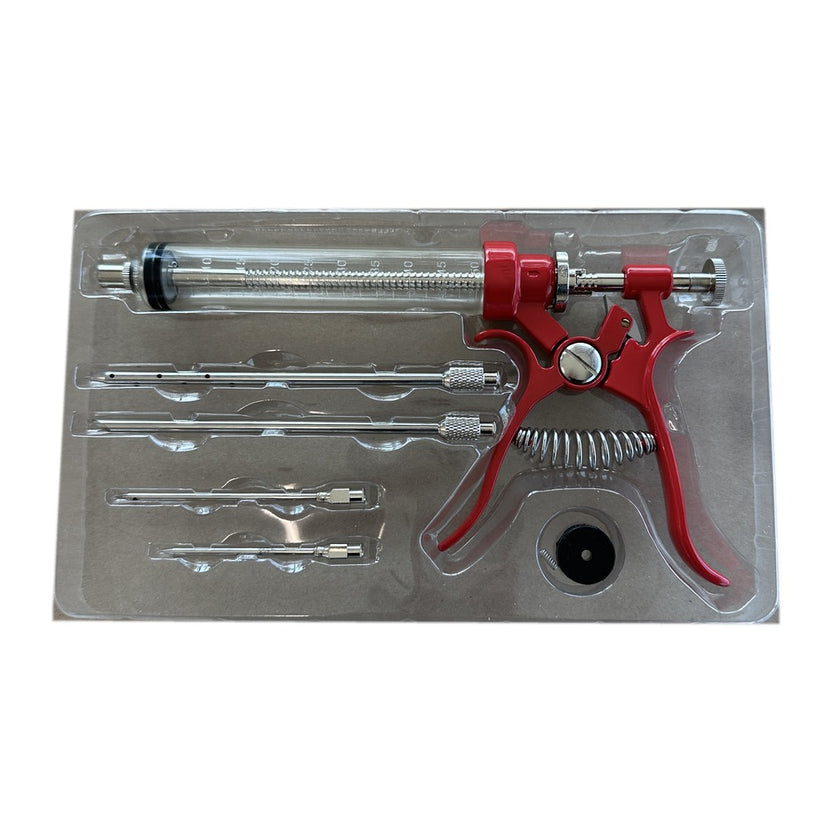 Meat injector gun kit with barrel and 4 stainless needles in its tray