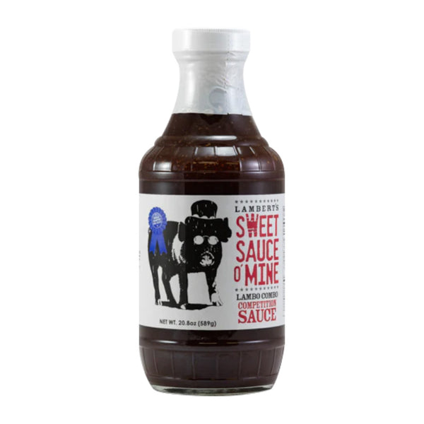 Bottle of Sweet Sauce O’ Mine Lambo Combo beside glazed ribs and pulled pork