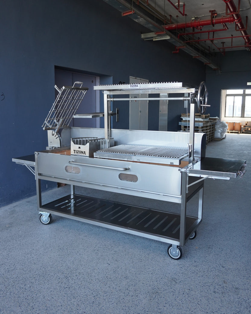 Tizona Garrison Max stainless Argentine Santa Maria grill - front three-quarter view